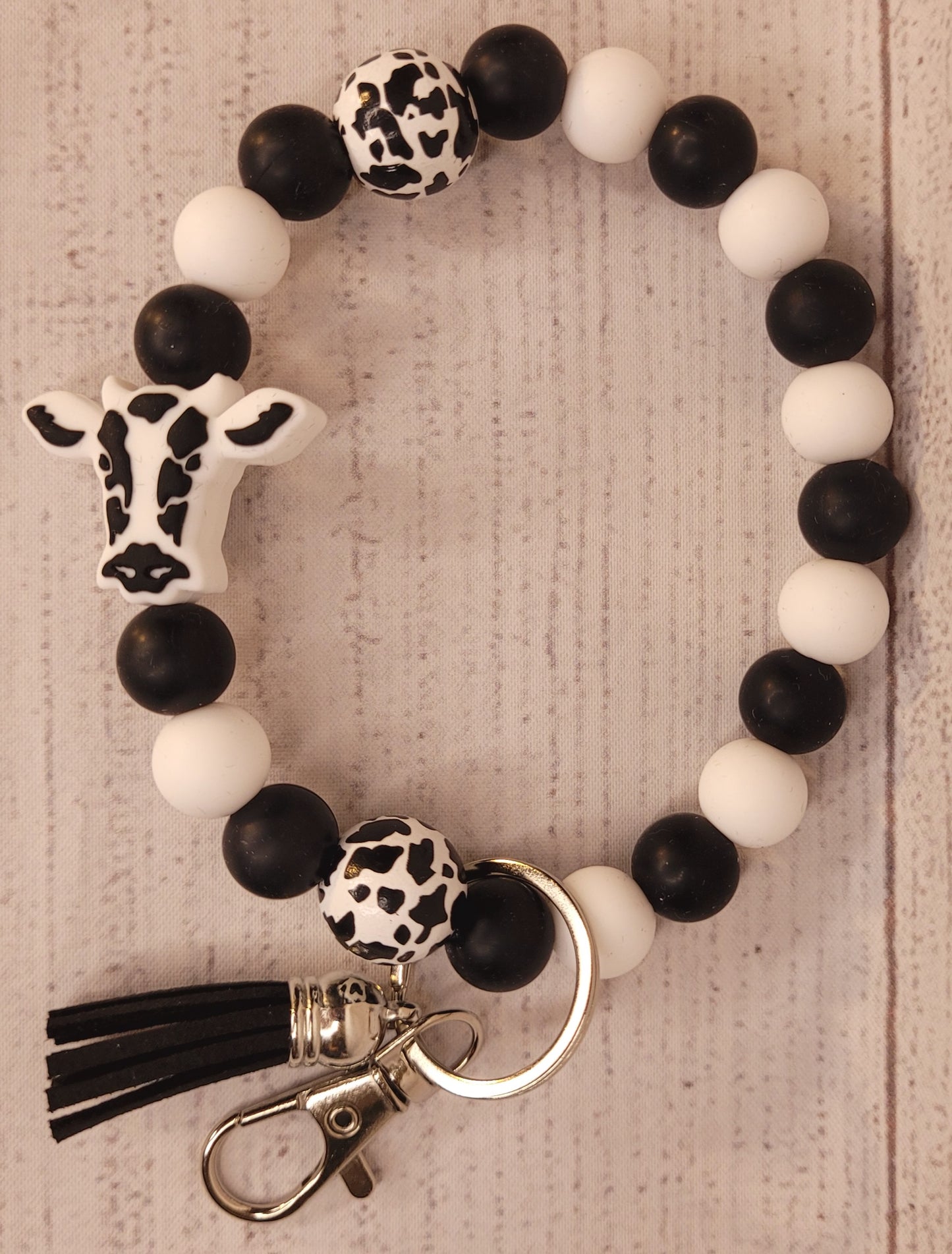 Cow cow print beaded wristlet